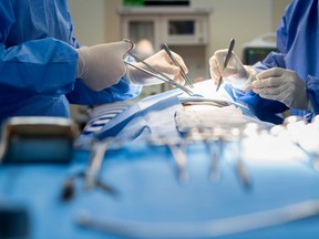 Surgery performed in a hospital operating room.