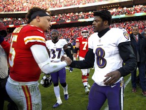 Lamar Jackson (right) of the Ravens and Chiefs' Patrick Mahomes both put up monster numbers last year with their  passing and running and should be the first two quarterbacks drafted in NFL pools this season.