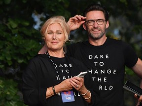 Australian actress Deborra-Lee Furness  and husband actor Hugh Jackman look on onstage at the 2019 Global Citizen Festival: Power The Movement in Central Park in New York on Sept. 28, 2019.