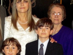 Domenica Gusciglio (rear, left),  Anna Sforz, and Gusciglio's children.