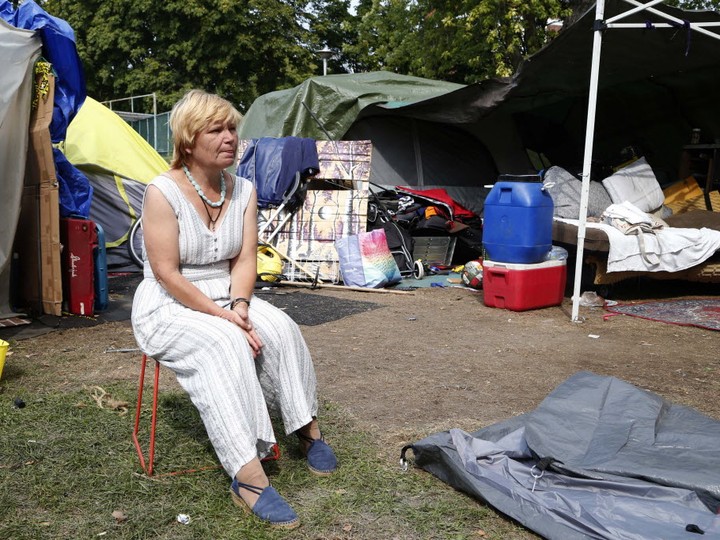  Julie Watson, 55, who has been camping out in Alexandra Park, one of the many tent cities that have sprung up across Toronto during the pandemic, is seen here on Thursday, Sept. 24, 2020.