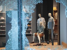 A window is shattered at an Timberland store along Michigan Avenue after it was looted on August 10, 2020 in Chicago, Illinois.