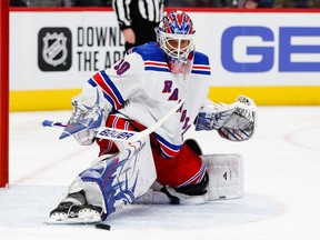New York Rangers goaltender Henrik Lundqvist makes a save in the second period against the Detroit Red Wings at Little Caesars Arena.
