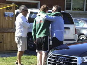 Durham Regional Police are on the scene of a where five people are dead inside a home on Parklane Ave. in Oshawa. Family members showed up to the scene to speak with homicide officers. The man is the blue dress shirt is believed to be the brother of the deceased husband inside the home. on Friday September 4, 2020.