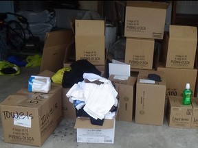 Boxes of items found at a Brampton home by the OPP after a nursing home in Bolton reported goods used to keep residents and staff safe from COVID-19 were stolen from the facility.