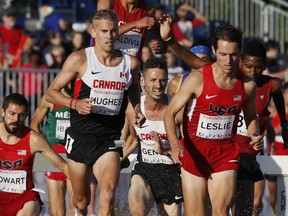 Canadian steeplechase runner Matt Hughes (centre) felt comfortable travelling through Europe competing over the summer.