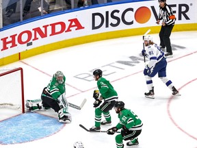 Tampa Bay Lightning’s Steven Stamkos (far right) scores past the blocker side of Dallas Stars goaltender Anton Khudobin during the first period in Game 3 of the Stanley Cup Final on Wednesday night in Edmonton. Stamkos, who was making his return to the lineup after spending the past 21 days rehabbing an injury, was not on the ice in the second and third periods.