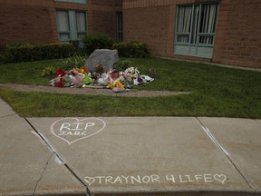A memorial for members of the Traynor family killed in a murder-suicide Friday morning in their Parklane Ave. home. The messages were scrawled outside Monsignor Paul Dwyer Catholic high school in Oshawa on  Monday September 7, 2020.