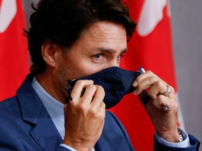 Prime Minister Justin Trudeau prepares to leave a news conference on Parliament Hill in Ottawa September 25, 2020.