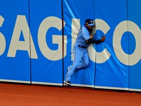 Teoscar Hernandez of the Toronto Blue Jays misses a fly ball in the second inning during Game 2 of the American League Wild Card Series against the Tampa Bay Rays at Tropicana Field on Wednesday.