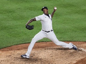 New York Yankees relief pitcher Aroldis Chapman delivers a pitch during the ninth inning against the Tampa Bay Rays at Yankee Stadium in New York, Sept. 1, 2020.