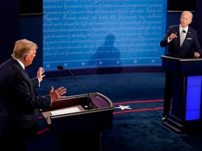 U.S. President Donald Trump and Democratic presidential nominee Joe Biden participate in their first 2020 presidential campaign debate held on the campus of the Cleveland Clinic at Case Western Reserve University in Cleveland, Tuesday, Sept. 29, 2020.