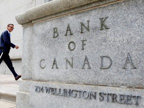 Governor of the Bank of Canada Tiff Macklem walks outside the Bank of Canada building in Ottawa, Ontario,