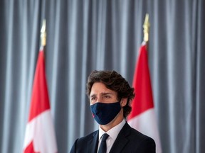 Canada's Prime Minister Justin Trudeau looks on before unveiling plans for post-coronavirus recovery for Black owned business and entrepreneurs in Toronto, Ontario, Canada September 9, 2020.