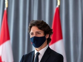 Canada's Prime Minister Justin Trudeau looks on before unveiling plans for post-coronavirus recovery for Black owned business and entrepreneurs in Toronto, Ontario, Canada September 9, 2020.
