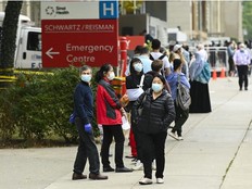 People wait in line for hours at a COVID assessment centre at Mount Sinai Hospital during the COVID-19 pandemic in Toronto on Thursday, September 24, 2020.