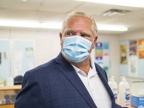 Ontario Premier Doug Ford takes a tour of Kensington Community School to see the measures implemented as students return to school amidst the COVID-19 pandemic on Tuesday, Sept. 1, 2020.