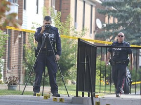 Toronto Place investigate on Gosford Blvd., in North York, on Friday, Sept. 25, 2020, the day after one man was killed and another was wounded by gunfire.