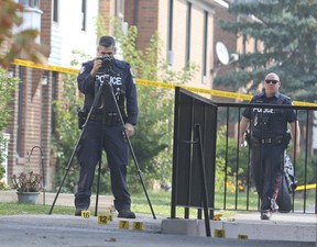 Toronto Place investigate on Gosford Blvd., in North York, on Friday, Sept. 25, 2020, the day after one man was killed and another was wounded by gunfire.