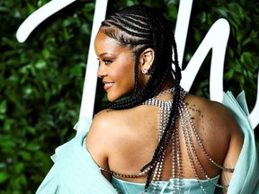 Singer Rihanna poses as she arrives at the Fashion Awards 2019 in London, Britain December 2, 2019.