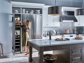 The Signature Kitchen Suite includes an integrated column wine refrigerator that protects wines from vibration and temperature changes. SUPPLIED