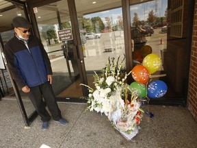 Omar Farouk, president of the International Muslim Organization (IMO) mosque on Rexdale Blvd., stands beside a make-shift memorial honouring murder victim Mohamed-Aslim Zafis, 58, on Sept. 19, 2020.