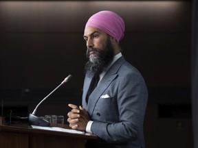 NDP Leader Jagmeet Singh listens to a question during a news conference in Ottawa, Tuesday, Sept. 15, 2020.