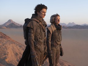 Timothée Chalamet as Paul Atreides and Rebecca Ferguson as Lady Jessica Atreides in Warner Bros. Pictures and Legendary Pictures’ action adventure Dune, a Warner Bros. Pictures release.