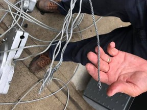 A window washer, who was on board a swing stage when it collapsed Thursday afternoon, said it may have been because of a copper clamp was not properly attached to the cable.