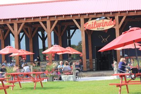 The patio at Tailwinds Bar and Grill is a popular place to watch float planes come in and out at Lake St. John in Ramara Township. IAN SHANTZ/TORONTO SUN