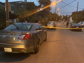 Toronto Police have cordoned off the scene near King George Rd. and Church St., in Weston, where two people were stabbed to death and a third was killed by a train on Saturday, Sept. 12, 2020.
