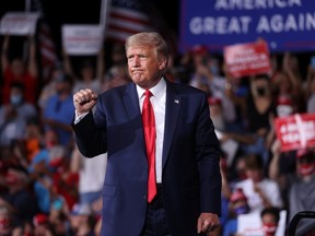 U.S. President Donald Trump concludes a campaign rally at Smith Reynolds Regional Airport in Winston-Salem, N.C., Sept. 8, 2020.
