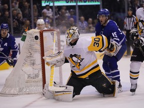 Pittsburgh Penguins goaltender Matt Murray makes a save on Toronto Maple Leafs forward Alexander Kerfoot (15) this past season. There is speculation the Leafs might be interested in acquiring Murray, who played for GM Kyle Dubas in 2011-12 with Sault Ste. Marie of the OHL.