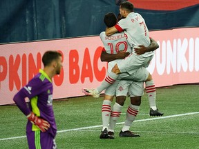 Toronto FC celebrate a goal by Ayo Akinola during Wednesday's game against the New England Revolution.