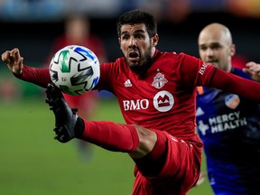 Toronto FC midfielder Alejandro Pozuelo  plays the ball against FC Cincinnati.