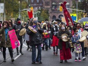 Demonstrators converged on University Ave. on Oct. 4, 2020 to call for justice after the death of Joyce Echaquan. The Indigenous woman filmed herself being insulted by staff at a Quebec hospital before her death.