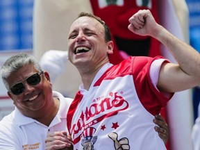 Joey Chestnut celebrates after winning the annual Nathan's Hot Dog Eating Contest on July 4, 2018 in the Coney Island neighborhood of the Brooklyn borough of New York City.