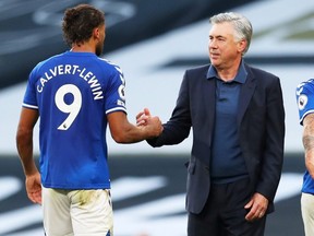 Everton manager Carlo Ancelotti (right) celebrates with Dominic Calvert-Lewin after Everton's 1-0 win over Tottenham Hotspur.