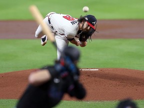 Atlanta Braves starting pitcher Ian Anderson (48) throws against the Miami Marlins during Game 2 of the 2020 NLDS at Minute Maid Park. Oct 7, 2020; Houston, Texas, USA; Atlanta Braves starting pitcher Ian Anderson (48) pitches against the Miami Marlins in the first inning during game two of the 2020 NLDS at Minute Maid Park. Mandatory Credit: Thomas Shea-USA TODAY Sports ORG XMIT: IMAGN-430933