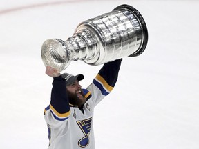 St. Louis Blues' Alex Pietrangelo carries the Stanley Cup after the Blues defeated the Boston Bruins in Game 7 of the NHL Stanley Cup Final, Wednesday, June 12, 2019, in Boston.