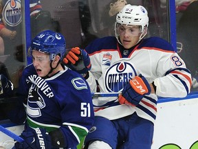 Defencemen Troy Stecher (left) and Matt Benning, cut loose by Vancouver and Edmonton, respectively, could interest the Leafs when NHL free agency opens on Friday.