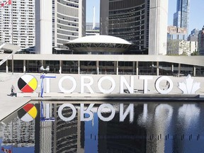 The Toronto sign is seen in front of city hall on Friday September 18, 2020.