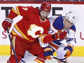 Defenceman TJ Brodie (left) should fit in nicely with the Maple Leafs, who signed the unrestricted free agent on Thursday.