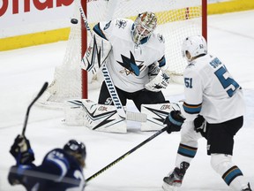 Goaltender Aaron Dell, showing making a save during his time with the San Jose Sharks, has signed with the Maple Leafs