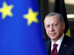 Turkish President Tayyip Erdogan arrives for a meeting with EU Council President Charles Michel in Brussels, Belgium March 9, 2020.