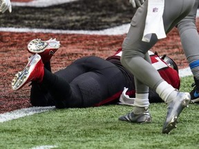 Atlanta Falcons running back Todd Gurley II (21) scores a touchdown while trying to remain short of the goal line against the Detroit Lions during the second half at Mercedes-Benz Stadium. USA TODAY