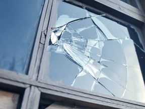 A broken glass window.
