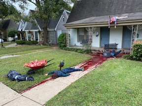 A Texas artist claims his home has become a frequent stop for local police after going full throttle in transforming his front yard into a stomach-churning murder scene for Halloween.