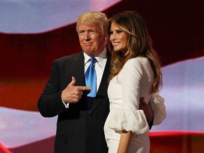 CLEVELAND, OH - JULY 18:  Presumptive Republican presidential nominee Donald Trump gestures to his wife Melania after she delivered a speech on the first day of the Republican National Convention on July 18, 2016 at the Quicken Loans Arena in Cleveland, Ohio. An estimated 50,000 people are expected in Cleveland, including hundreds of protesters and members of the media. The four-day Republican National Convention kicks off on July 18.  (Photo by Joe Raedle/Getty Images)