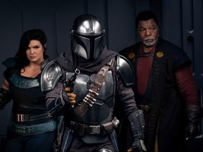 Gina Carano, Pedro Pascal and Carl Weathers in a scene from Season 2 of The Mandalorian.